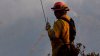Firefighters battle brush fire in Murrieta