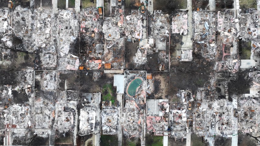ALTADENA, CALIFORNIA – FEBRUARY 12: An aerial view of a swimming pool and homes destroyed in the Eaton Fire on February 12, 2025 in Altadena, California.  A powerful atmospheric river storm is expected to impact Southern California with growing concerns of rock slides and mudslides in recent burn scar areas including hillside areas impacted by the Palisades and Eaton fires. (Photo by Mario Tama/Getty Images)