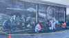 Artist working to restore mural on Culver City DMV wall